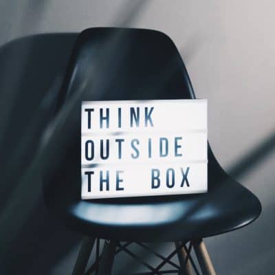 Sign on a chair- Think outside the box